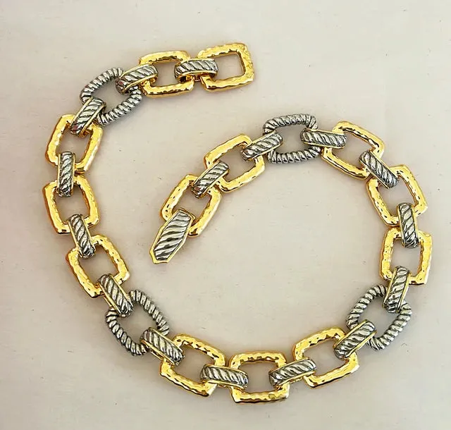 Chunky 2 tone gold / silver metal link style necklace.