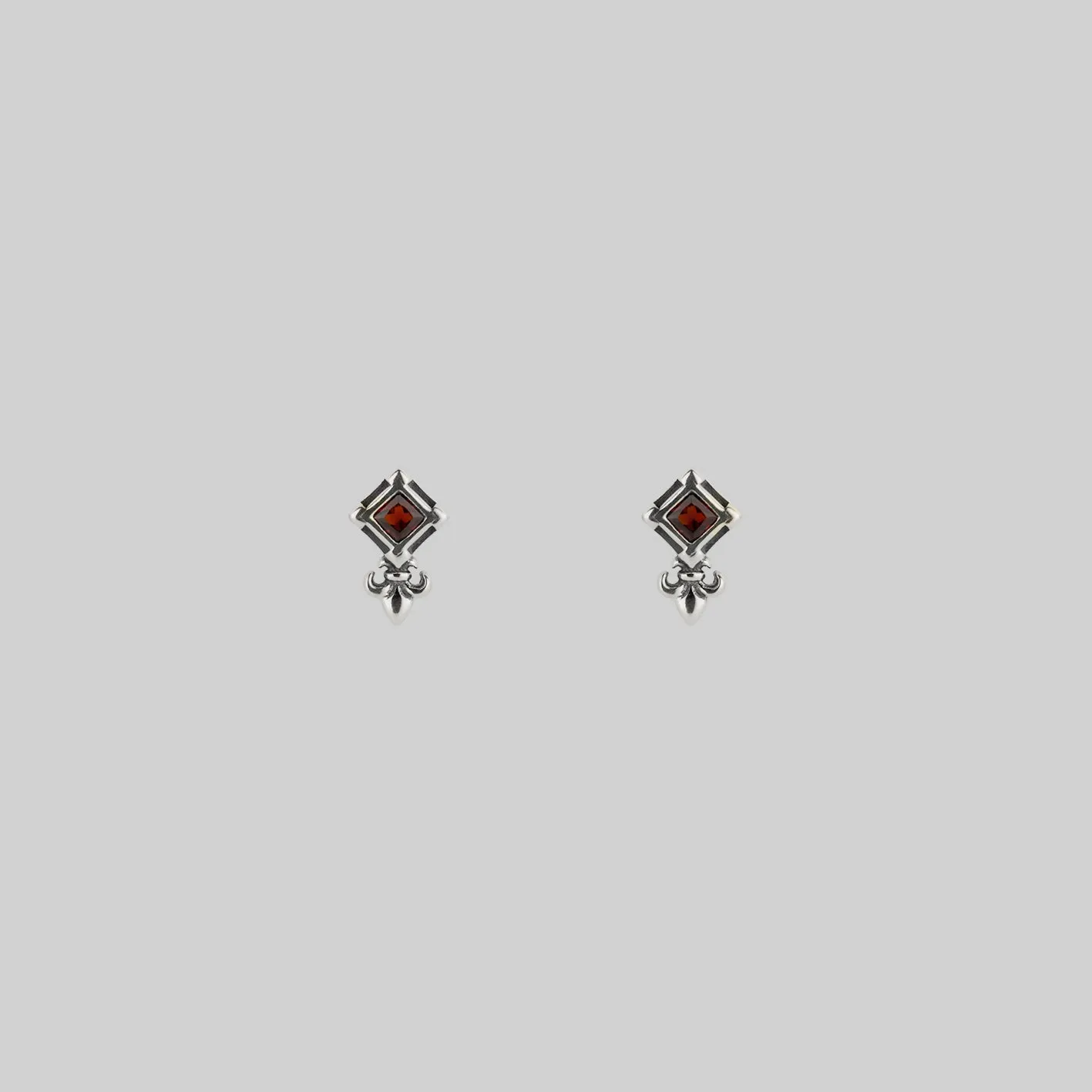 SCORN. Tiny Garnet Stud Earrings - Silver